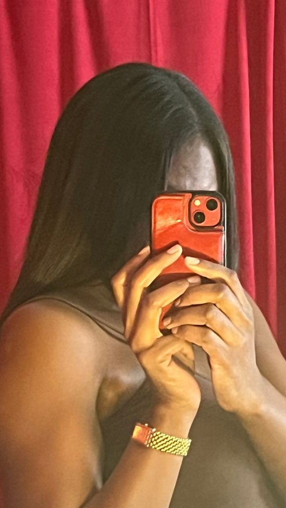 Silk press hairstyle showing smooth movement and shine styled at Main Character Hair studio.